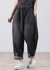 Schwarze Taschen Baumwolle Denim Haremshose Hohe Taille Loch